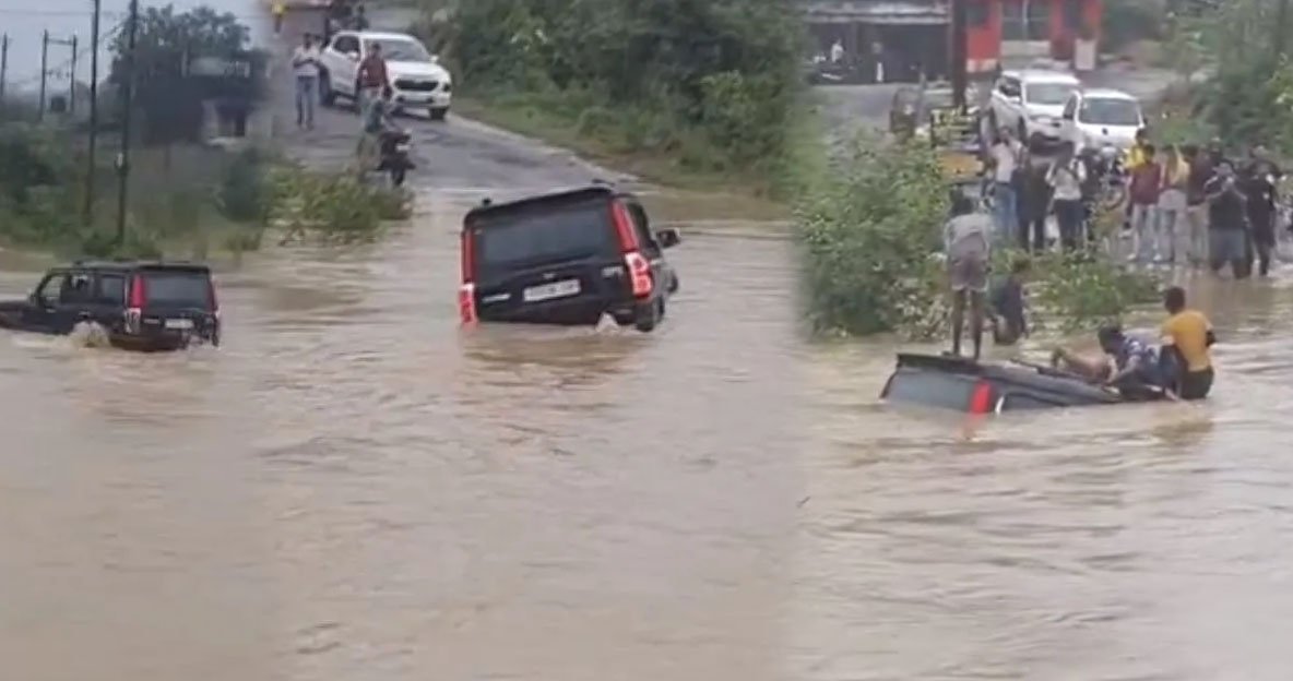 उफनते नाले में बह गई स्कॉर्पियो